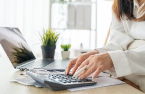 close-up of calculator and legal forms